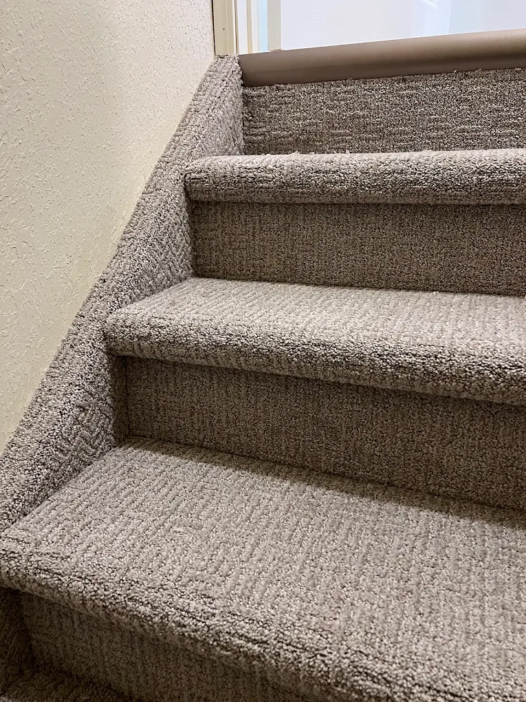 Carpet on stairs is one of the fastest ways to add warmth and safer footing in a Jackson or Battle Creek home.