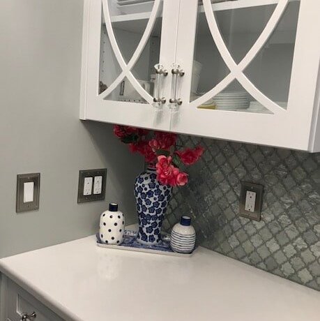 A lovely, refined Blasius Cambria White Cliff counter creates an elegant ambiance.