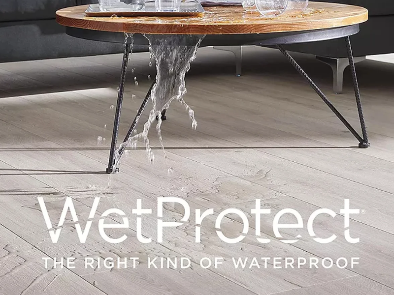Water spilled on a new RevWood floor featuring WetProtect technology